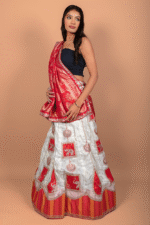 Cream & Red Shimmer Lehenga with Ganesha Embroidery and Banarasi Zari Dupatta