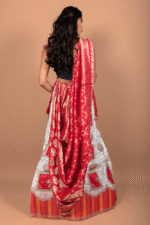 Cream & Red Shimmer Lehenga with Ganesha Embroidery and Banarasi Zari Dupatta - Image 2