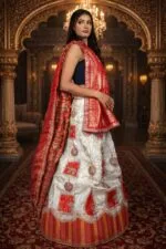 Cream & Red Shimmer Lehenga with Ganesha Embroidery and Banarasi Zari Dupatta - Image 2