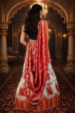 Cream & Red Shimmer Lehenga with Ganesha Embroidery and Banarasi Zari Dupatta - Image 3