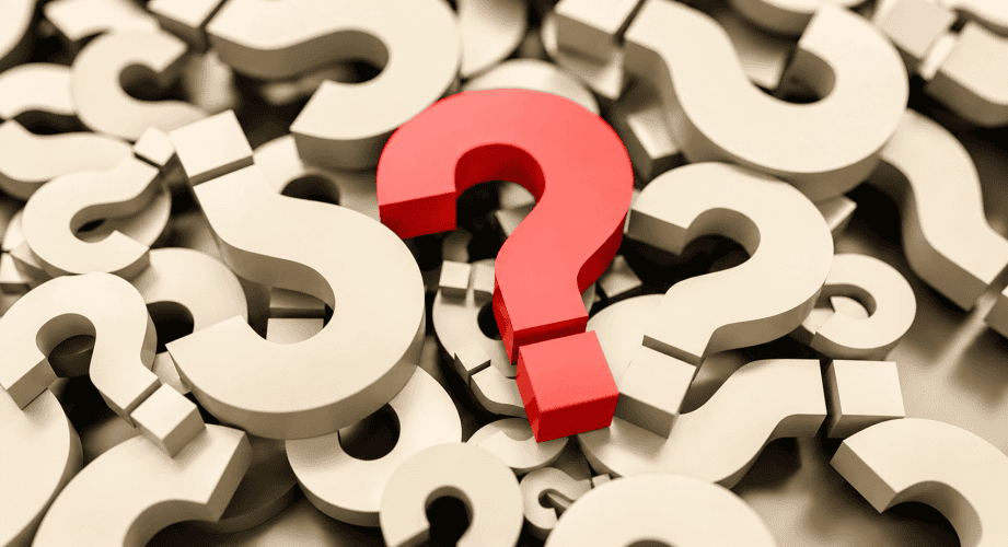 Red Question Mark Among Ivory Shapes